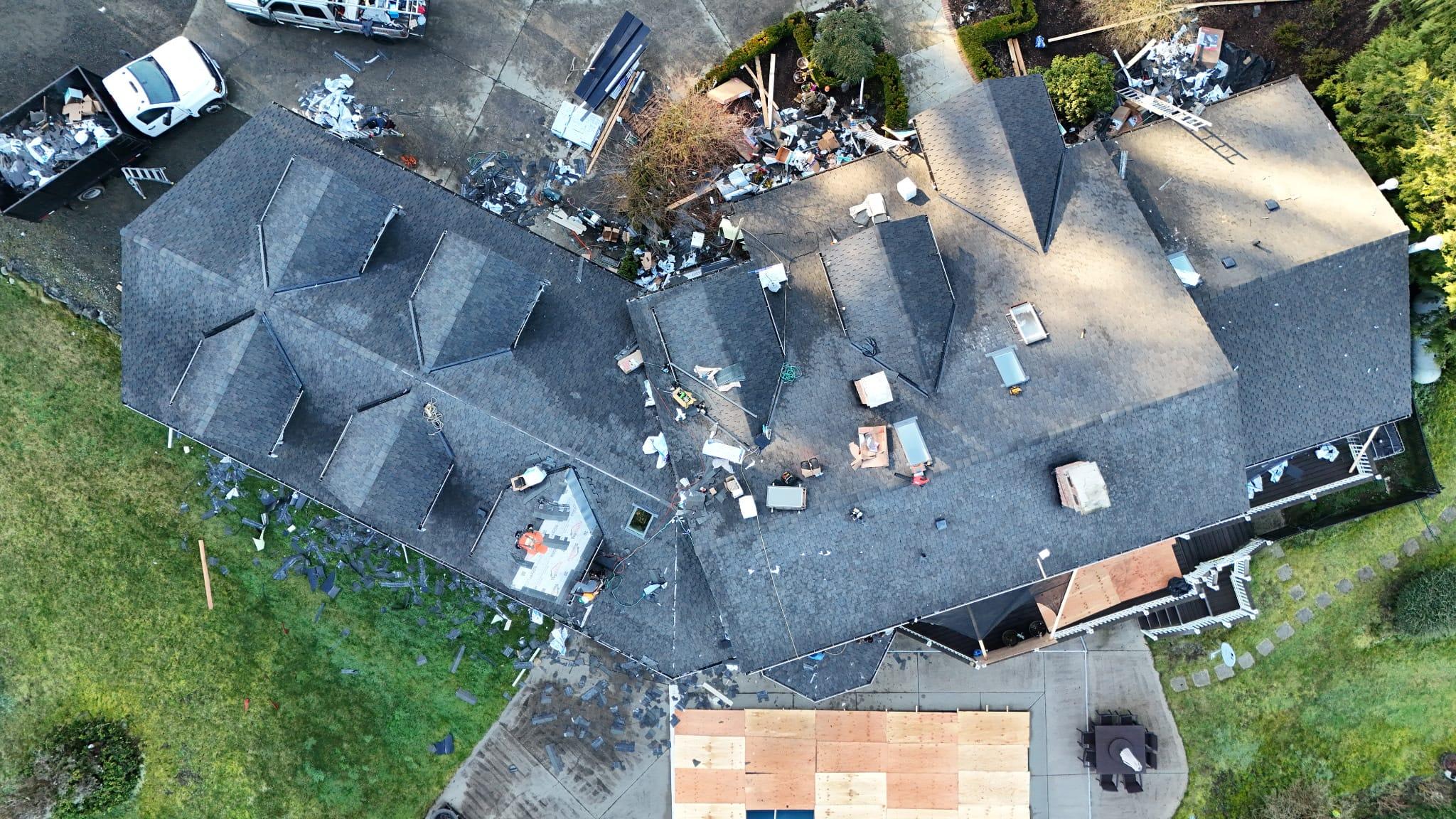 Aerial view of a Seattle residential roof showing typical Pacific Northwest roofing conditions